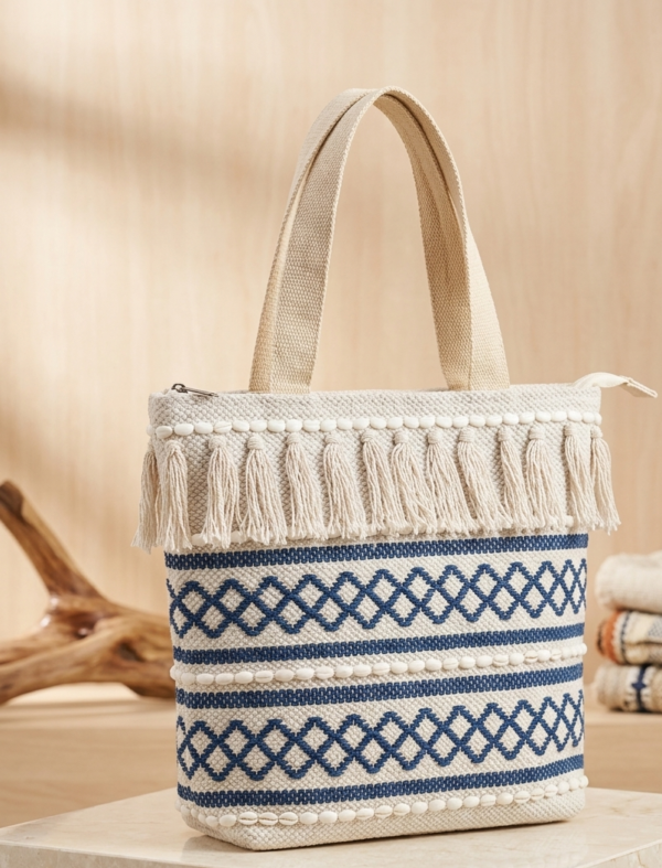 Gemini_Generated_Image_lvh46zlvh46zlvh4 Handwoven Cotton Tote Bag with Blue Geometric Pattern, Bohemian Tassels, and Pom-Poms – Stylish Shoulder Bag for Daily Use, Beach, and Travel